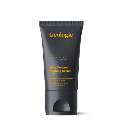 A tube of Geologie Tone Control Face Cream with SPF15 with labels indicating it contains azelaic acid, hyaluronic acid, and niacinamide, with mattifying complex and SPF 15.