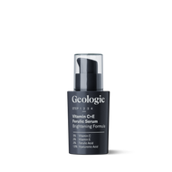A bottle of Geologie's Vitamin C+E Ferulic Serum on a black background.